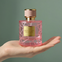 Flacon de parfum en verre rose cylindrique moderne de 50 ml et 100 ml, avec couvercle à motif cuir, logo personnalisé OEM disponible