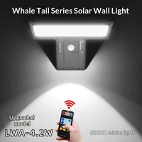 Lampe solaire extérieure sans perçage 2025 avec capteur intelligent, étanche, en forme de queue de baleine, à faible consommation d'énergie, idéale pour les villas rurales et les jardins.