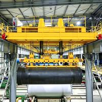 Pont roulant magnétique de 32 tonnes à double poutre pour l'opération de manutention de billettes d'acier en usine métallurgique