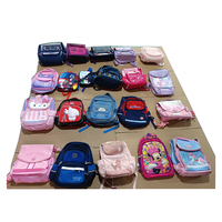 Venta al por mayor de mochilas escolares usadas de alta calidad en fardos de mochilas de segunda mano para niños de marca original
