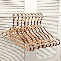 10 pièces Cintres en tissu de haute qualité durables en film PE Conception flexible Option de couleur 42x19x1.2cm pour adultes et enfants