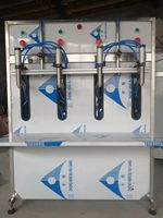 Machine de remplissage de liquides semi-automatique - Remplisseur pneumatique à double tête pour miel/pâte/détergent
