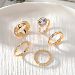 Sampel perhiasan gratis pengiriman cincin perhiasan paduan tembaga baja tahan karat berlapis emas fashion