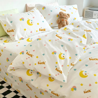 Ensemble de literie jetable de voyage en quatre pièces : drap, taie d'oreiller, housse de couette