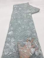 Tissu en dentelle à paillettes 100% polyester avec broderie florale pour robes de mariée et vêtements élégants de luxe