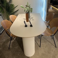 Table à manger semi-circulaire de luxe blanc crème 2026 pour espaces compacts