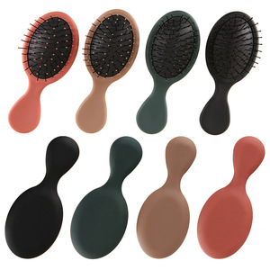Mini peigne à coussin avec manche en résine, peigne lissant portable pour lisser les cheveux, pour usage domestique et en salon, 4 couleurs disponibles - Product Image 1