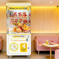Machine de jeu d'arcade à grue avec structure métallique, accepteur de pièces et de billets, garantie 1 an pour les centres de jeux