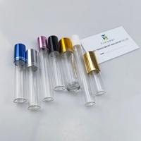 Venta al por mayor de mini botellas de perfume de vidrio portátiles recargables de 2ml, 3ml, 5ml, 10ml, atomizadores de cosméticos con serigrafía y cartón.