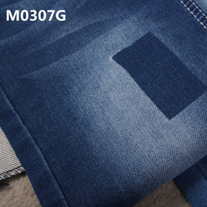 Doble desgaste denim Pantalones vaqueros de tela de peso ligero de alta calidad costo eficaz y mejor venta - Product Image 1
