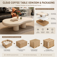Table basse en forme de nuage arrondie avec un profil bas et une base cylindrique pour la maison, l'hôtel, le salon et la zone de réception