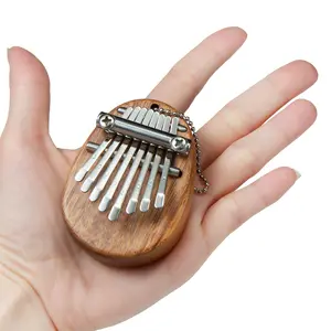 Mini Kalimba 8 tuşları katı ahşap parmak başparmak piyano taşınabilir Marimba enstrüman başparmak piyano cep müzikal hediyeler