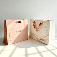 Bolsas de Papel Color Nude de Alta Gama con Logotipo Personalizado Estampado en Caliente con Asas de Cinta Dorada Rosa para Empaquetado de Marca