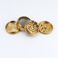 63mm 4 couches antidérapantes or accessoires de fumer dents pointues broyeur d'épices haut magnétique en gros unique en aluminium broyeur d'herbes