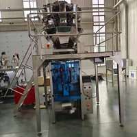 Machine d'emballage automatique à film en rouleau PLC à économie d'énergie 100-2000g pour cacahuètes et graines de melon