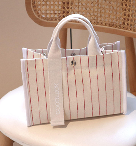 Wholesale high-quality women's mini cotton tote <b>bags</b>, customizable in color and logo shopping <b>bags</b> - Product Image 1