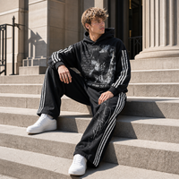 Ensemble de survêtement streetwear personnalisé coupe ample à rayures imprimées numériquement, effet délavé à l'acide et décoloré par le soleil, comprenant un sweat à capuche et un pantalon à double ceinture