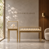 Ensemble de vitrine de présentation de bijoux commerciaux, cadre en métal couleur laiton, table de présentation en verre avec éclairage LED pour bijouterie