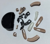 Composants de revêtement interne en plastique de qualité médicale personnalisés ISO 13485 pour appareils auditifs numériques