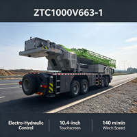 Grue sur camion d'occasion de 100 tonnes, flèche de 60,5 m, contrepoids total de 23,5 t, châssis 8x4 de classe G pour l'exploitation minière et les champs pétrolifères