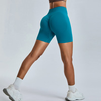 Venta al por mayor de mujeres de cintura alta sin costuras activo Scrunch Yoga Shorts Control de barriga Levantamiento de glúteos Gimnasio Entrenamiento Pantalones cortos transpirables ajustados