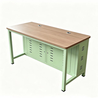Bureau d'ordinateur moderne à double poste avec rangement verrouillable et gestion des câbles, structure en acier robuste pour salle de classe et bureau