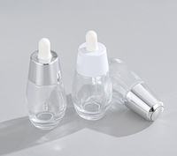 Vente en gros de flacons compte-gouttes en verre transparent de luxe personnalisés de 30 ml et 50 ml, contenants vides pour huiles essentielles, soins de la peau, sérums