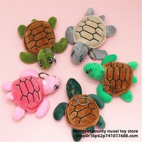 Vente en gros de jouets en peluche tortue de mer super doux et colorés, rembourrés en coton PP, accessoires de porte-clés pour sacs de femmes