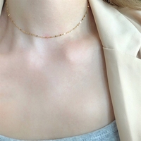 Collier Bowei à superposition, design géométrique ajouré original pour femme