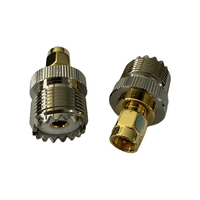 Adaptador de buena calidad SMA/UHF hembra a conector adaptador macho SMA