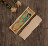 Boîte de présentation de cadeau de bijoux en bois décoratif créatif fait à la main en forme de rectangle avec couvercle sculpté creux pour l'utilisation de boissons