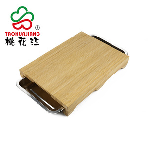 Planche à découper en <span class=keywords><strong>bambou</strong></span> Moso de qualité supérieure avec 2 plateaux coulissants en acier inoxydable et rainures pour le jus, pour une préparation et un rangement hygiéniques des ustensiles de cuisine - Product Image 1