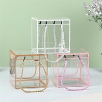 Vente en gros d'emballage pliable de bonbons de mariage boîte cadeau en PVC transparent poignée torsadée boîtes en plastique en PVC carré transparent PP PET