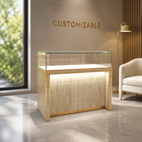 Maßgefertigte Steinverkleidung Goldener Metallrahmen Schmuck-Vitrine LED-Beleuchtung Glas-Top-Schaukasten Halsketten-Shop Großhandel Einkaufszentrum