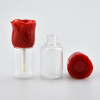 Récipient vide luxueux de rouge à lèvres de 15ml avec un tube de brillant à lèvres en forme de rose rouge