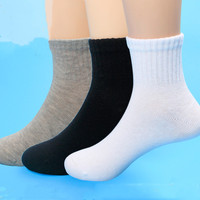 1 paire de chaussettes classiques respirantes en coton/polyester, noires, blanches et grises, unies pour enfants