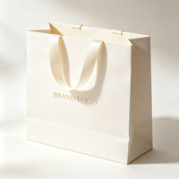 Sac en papier personnalisé avec logo doré, nœud en satin, poignée torsadée, sac cadeau de luxe pour emballage de marque