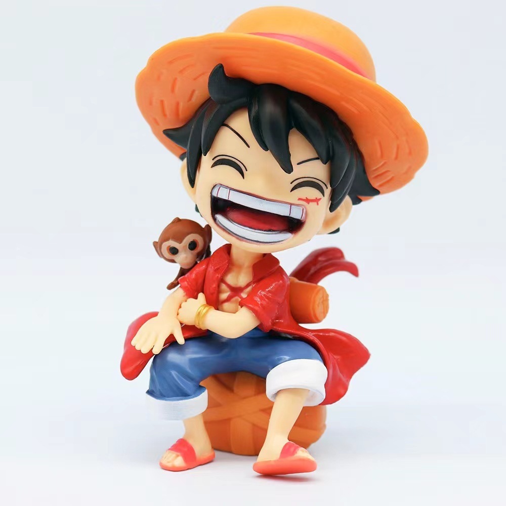Luffy rojo riendo - 13cm de altura, en caja.