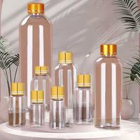 3ml 5ml 8ml 10ml 15ml 20ml Fabricants Vente en gros Bouteilles transparentes en plastique à petite ouverture pour animaux de compagnie avec couvercles à vis en aluminium