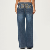 Jean vintage ample pour femme avec broderie effet vieilli, taille basse et coupe droite