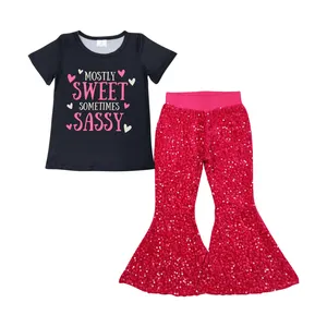 Camicia corta nera con stampa impertinente a fumetti pantaloni rosa caldo con paillettes Jeans set di abbigliamento per ragazze