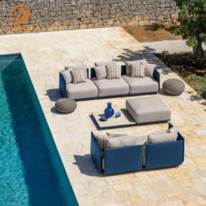 Set di Divani Sezionali da Esterno Moderni e Geometrici, Mobili da Patio in Stile Box <span class=keywords><strong>Blu</strong></span> Navy Intenso con Cuscini Color Crema e Pouf Rotondi - Product Image 1