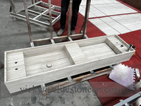 Meuble-lavabo flottant en marbre blanc naturel sur mesure avec rangement encastré