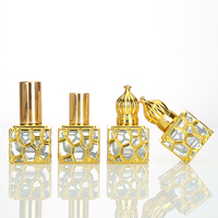 Venta al por mayor personalizado 10ml exquisita botella de spray de perfume de oro cuadrado de lujo de gama alta de estilo árabe botellas de vidrio vacías Attar