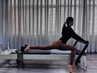 Peralatan Gym Boutique Sistem Peredam Getaran Silent Springs Glide System Reformer Pilates Kayu Aluminium Hibrida Mewah Bersertifikasi CE ISO