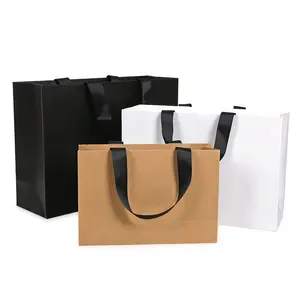 custom unique paper packaging bags glossy gift bags with ribbon for clothing