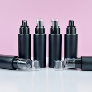 Fancy <b>Empty</b> Cylinder Round 30ml 50ml 60ml 100ml 120ml Matte Black Glass Cosmetic Emulsion Bottles Packaging With Pump - Product Image 3