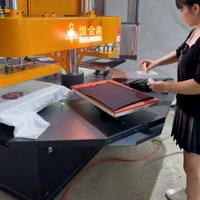 Presse à chaud pneumatique à carrousel avec deux têtes chauffantes, plateau rotatif à 6 stations 40x60cm pour transfert DTF sur t-shirts personnalisés