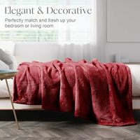 Vente en gros de couverture tricotée en molleton de corail rouge épais et coloré pour l'hiver