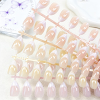 Faux ongles courts à presser, forme French demi-lune œil de chat, couleur unie nude poudré, effet illuminateur, chic, vente en gros, ongles finis
